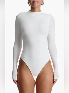 91. Naked Wardrobe $58 (current) Long-Sleeve White Mock Neck Bodysuit